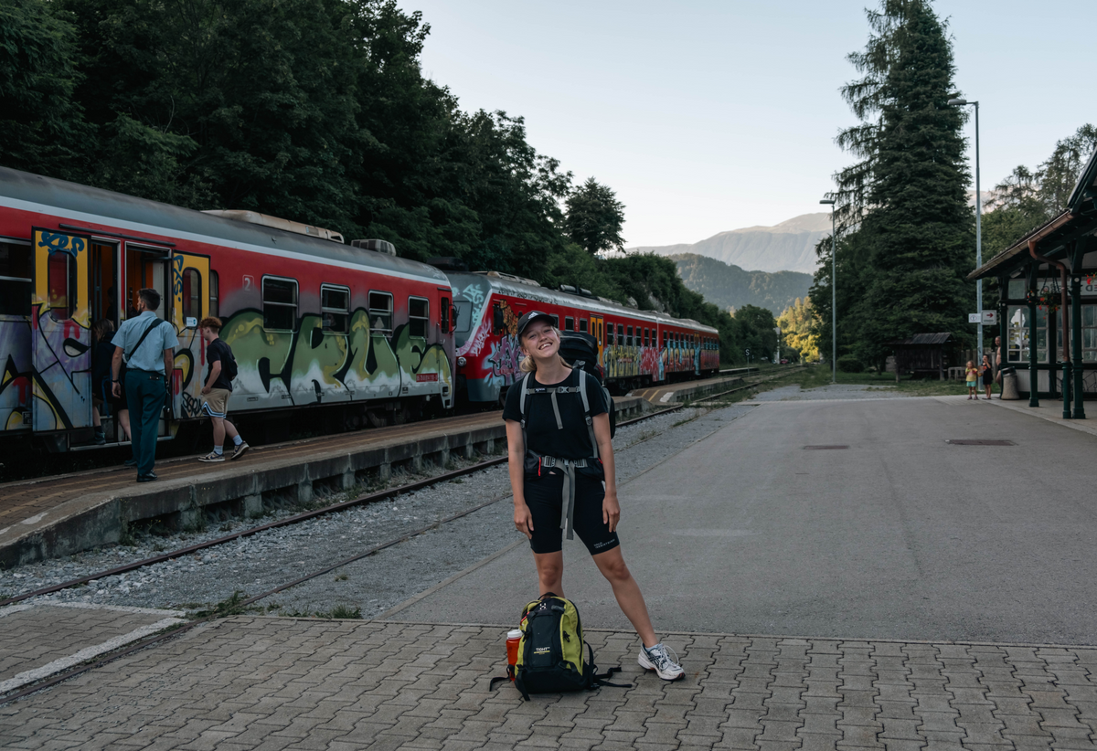 Interrail with a backpack at a station